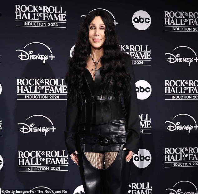 Cher has revealed she lost her virginity at the age of 14 to get revenge on her older boyfriend, in a shock confession from her recently released memoir, Cher: The Memoir, Part One – pictured last month