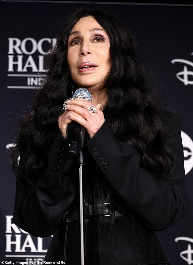 Following the release of the first part of her memoir on November 19, DailyMail.com recalls Cher's most iconic quotes; pictured on October 19 as she is inducted into the Rock & Roll Hall Of Fame in Cleveland, Ohio