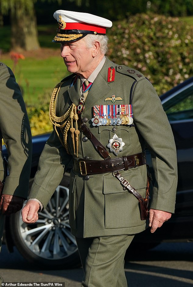 The King appeared in good spirits today as he arrived at the Royal Marines Commando Training Center at Lympstone in Devon