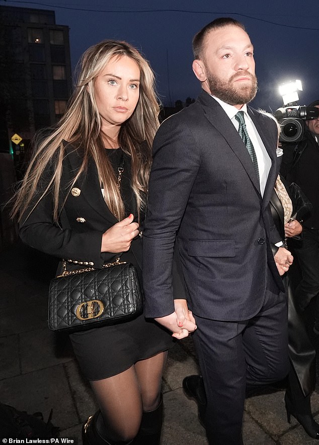 Conor McGregor leaves the High Court with his girlfriend Dee Devlin. A civil court jury found he sexually assaulted a woman at a hotel in south Dublin in December 2018.