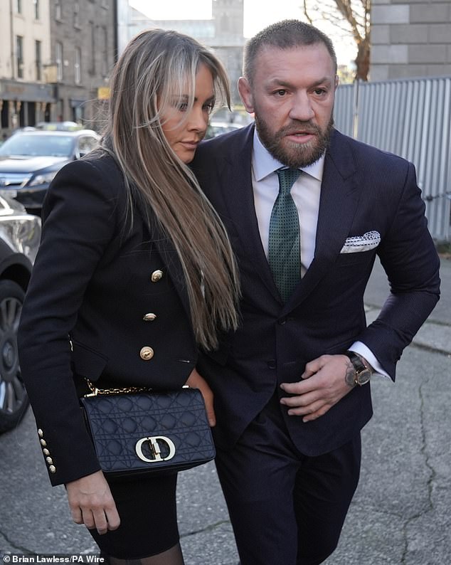 MMA fighter Conor McGregor and partner Dee Devlin outside the High Court in Dublin