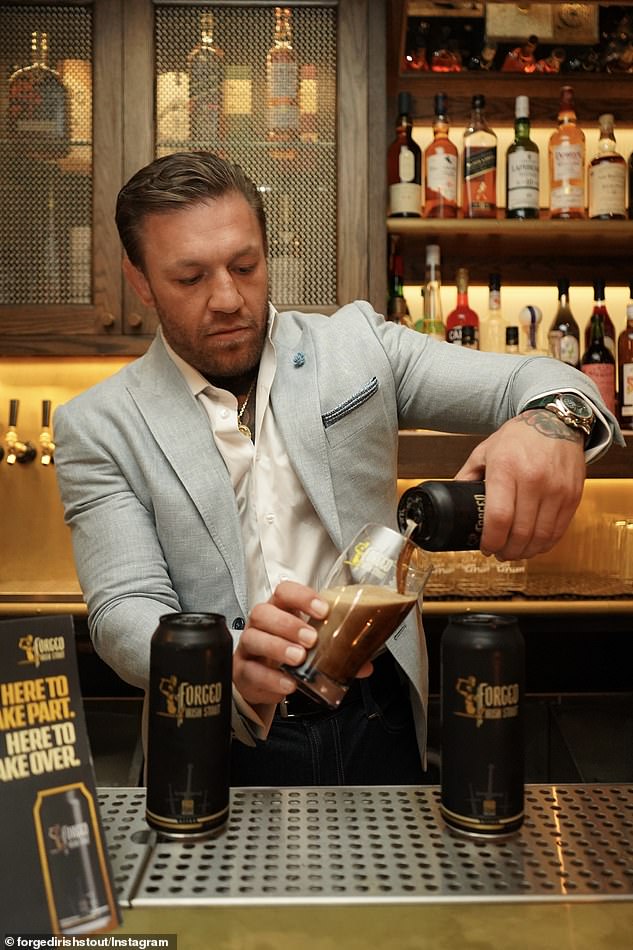 Embarrassed MMA fighter Conor McGregor has been pictured pouring his own Forged Irish Stout