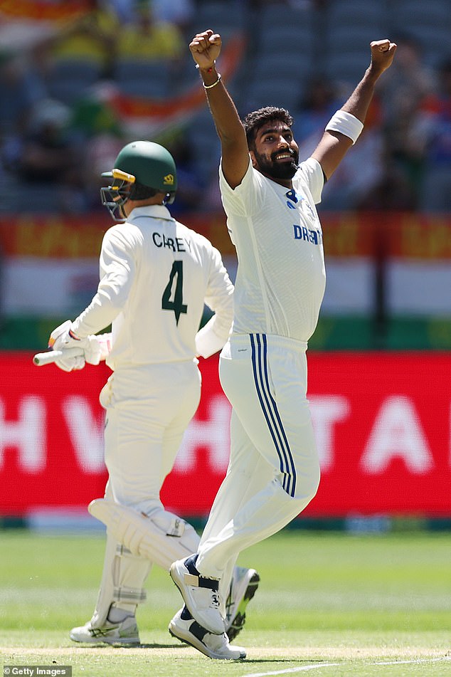 Bumrah celebrates the key wicket of Australian wicketkeeper Alex Carey in the first Test