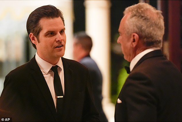 Matt Gaetz talks with Robert F. Kennedy Jr. before President-elect Donald Trump speaks during an America First Policy Institute gala at his Mar-a-Lago estate, Thursday, Nov. 14, 2024, in Palm Beach, Florida. selected to join Trump's cabinet