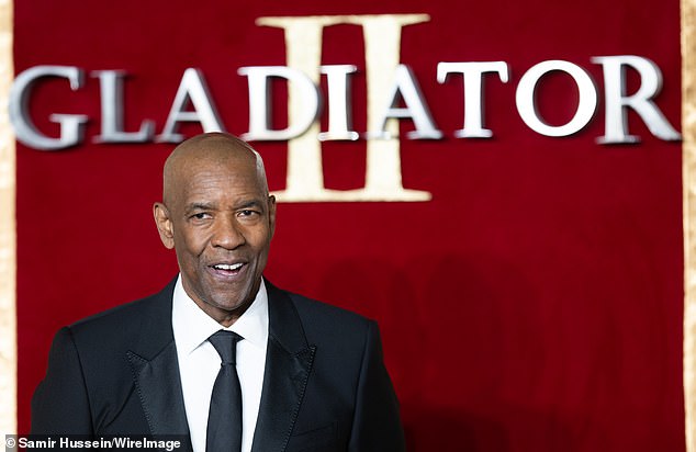 Denzel Washington revealed one of the Gladiator II scenes that ended up on the cutting room floor ahead of the release of Ridley Scott's $310 million budget historical epic (pictured Wednesday)