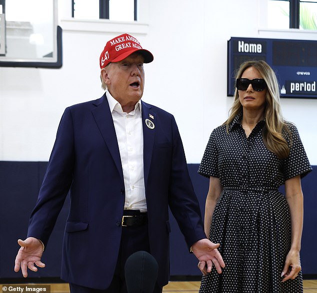 Donald and Melania Trump speak to reporters after casting their votes in the 2024 election in Palm Beach, Florida on Tuesday, November 5