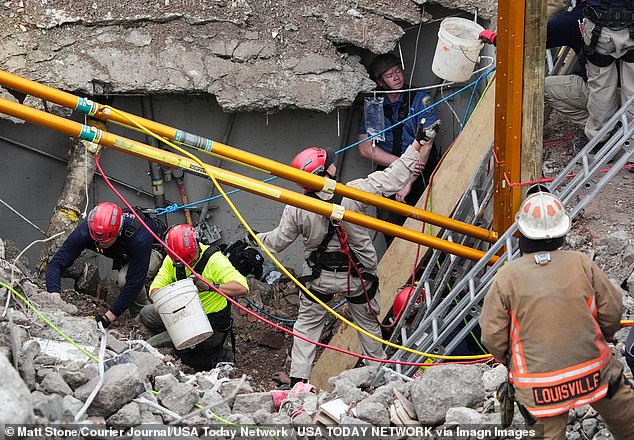 Rescue crews worked for more than nine hours at a construction site in Louisville, Kentucky, on Thursday after a worker was buried alive under 10 feet of rubble.