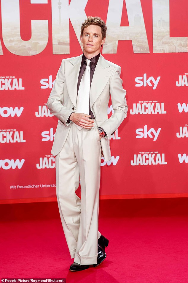 Eddie Redmayne's latest character is a 1970s icon, just like the flared trousers he wore to the Berlin premiere of The Day of the Jackal on Tuesday night