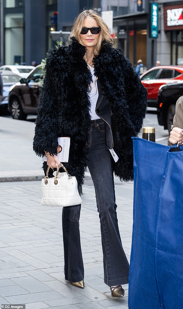 Elle Macpherson looked as youthful as ever as she stepped out in Midtown Manhattan, New York, on Tuesday after detailing the depths of her alcohol addiction.