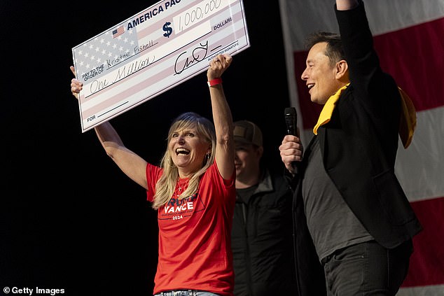 Elon Musk awarded Kristine Fishell a check for $1 million. Musk has given $1 million checks to randomly selected people who sign a petition pledging support for free speech and gun rights