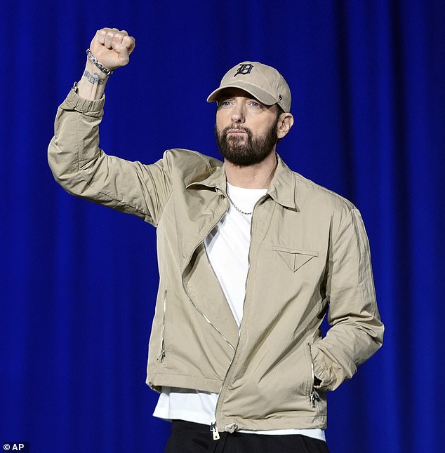 Eminem, pictured here on October 22, will make a 'comedic' cameo in Adam Sandler's upcoming film Happy Gilmore 2