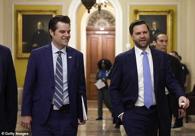 Former Rep. Matt Gaetz (L), President-elect Donald Trump's nominee to become attorney general, walks with newly elected Vice President JD Vance (R) as they arrive for meetings with senators at the U.S. Capitol on Nov. 20 2024 in Washington, DC