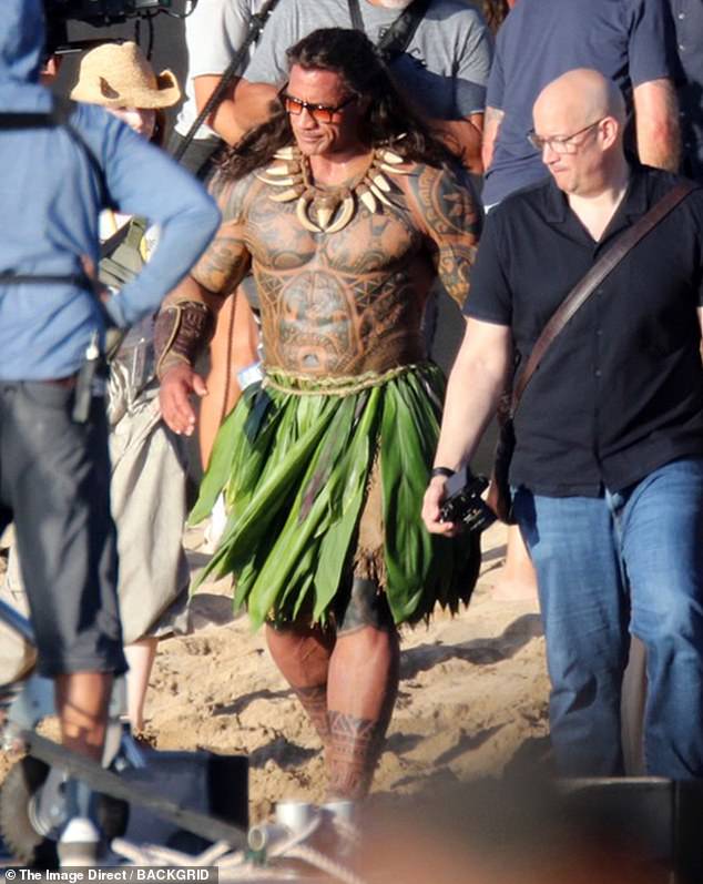 Dwayne 'The Rock' Johnson showed off his toned physique this week as he filmed scenes for Disney's live-action Moana movie in Hawaii