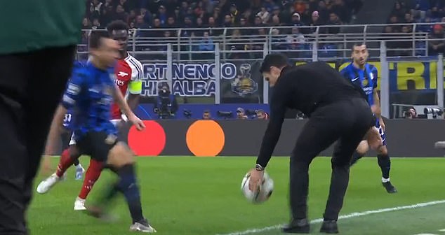 Fans are convinced Mikel Arteta should have been sent off for handling the ball while it was still in play during Arsenal's narrow 1-0 defeat to Inter Milan on Wednesday night