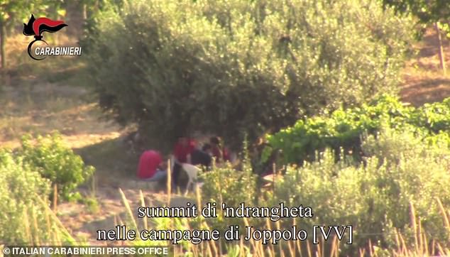 An image from a video release by the Italian Carabinieri Police press service on December 19, 2019 shows an undated meeting of southern 'Ndrangheta mafia bosses