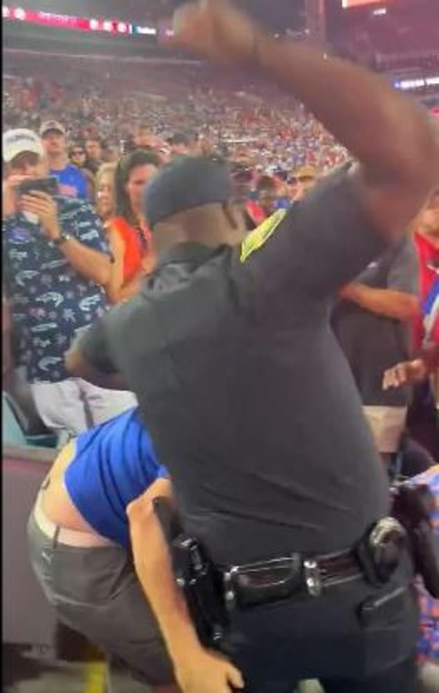 A security guard hit a Florida fan with a series of hammer fists during Saturday's game