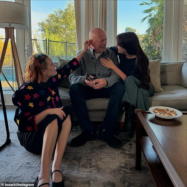 The frail Bruce Willis was spotted in a rare snap as he celebrated Thanksgiving with his family on Thursday, amid his battle with frontal-temporal dementia (FTD)