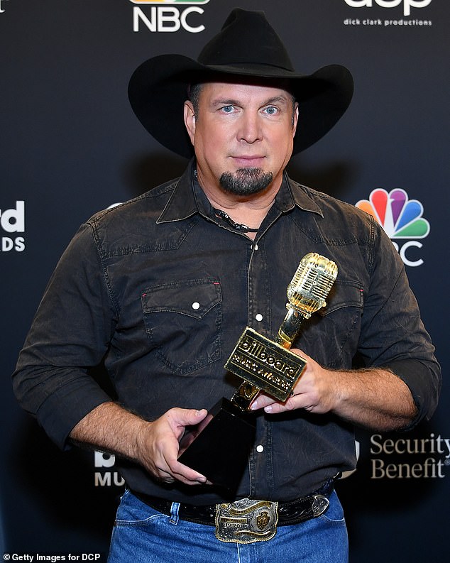 Brooks is from Tennessee and the woman is from Mississippi, which could help a move to federal court. She filed her lawsuit in California; pictured at the 2020 Billboard Music Awards