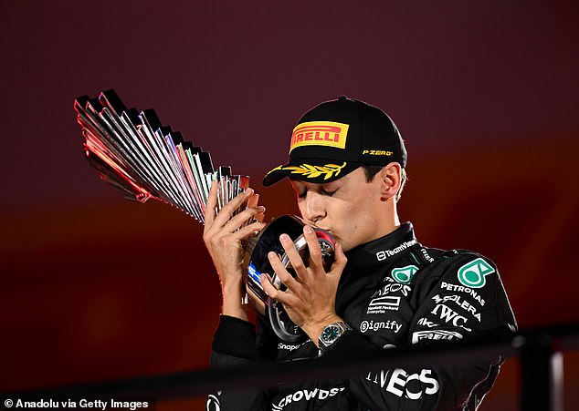 George Russell with the trophy after winning the Las Vegas Grand Prix in grand style, the third victory of his career