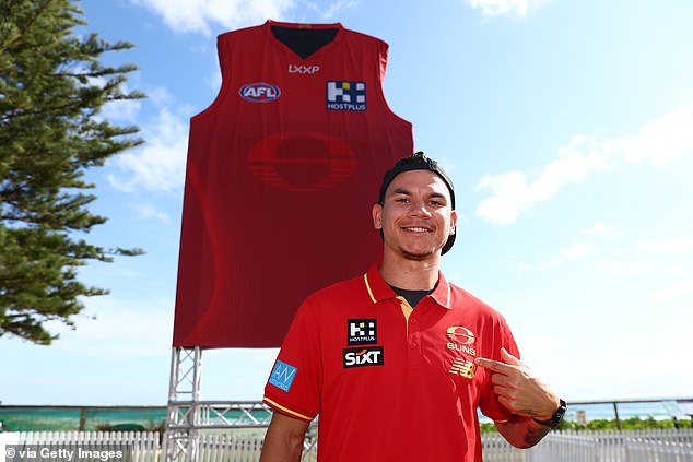 Gold Coast star Daniel Rioli was pictured modeling the club's new look on Friday