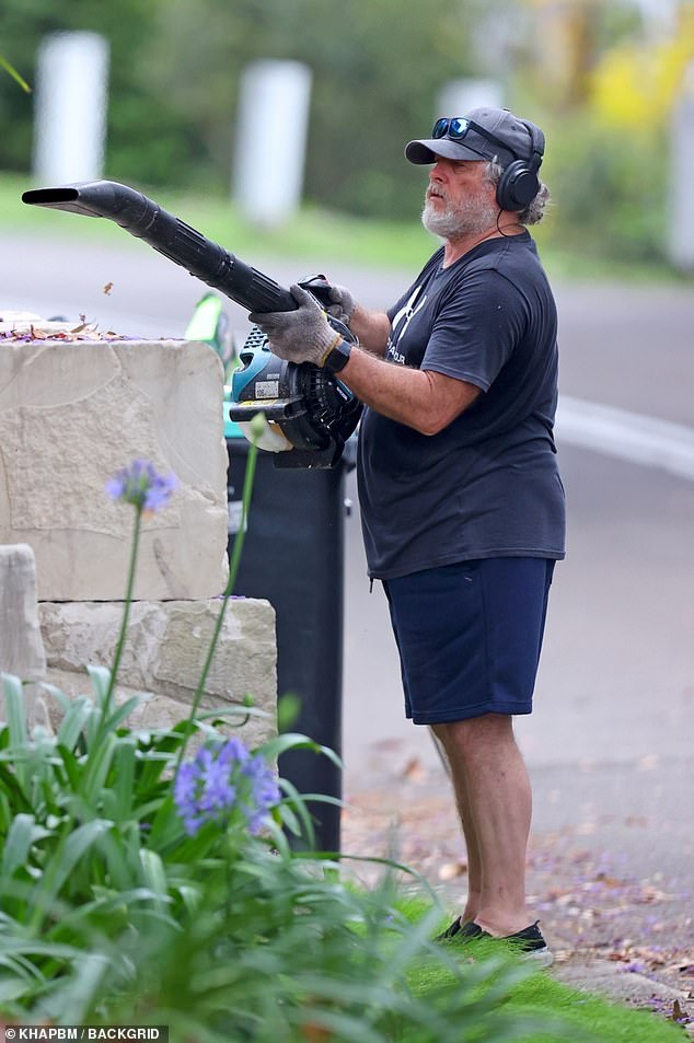 Peter Phelps was spotted on the tools outside his Sydney home on Monday looking a far cry from his heartthrob status of yesteryear. Pictured