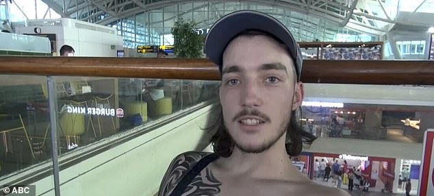 The heavily tattooed passenger at Bali's Denpasar International Airport, who appeared shirtless, launched an expletive-filled tirade at Jetstar