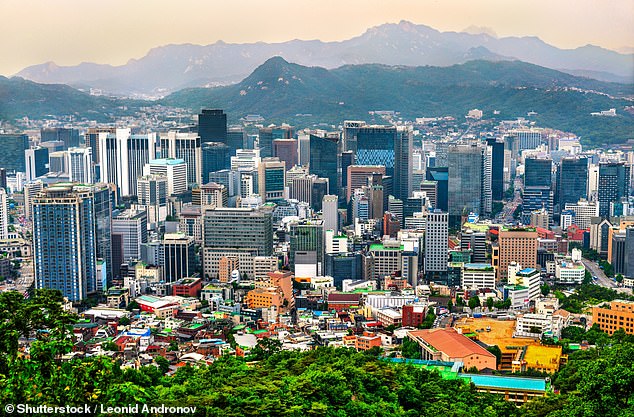 Seoul city skyline from Namsan Mountain Park in South Korea (file image). Conscription in the country requires male citizens between the ages of 18 and 28 to perform mandatory military service