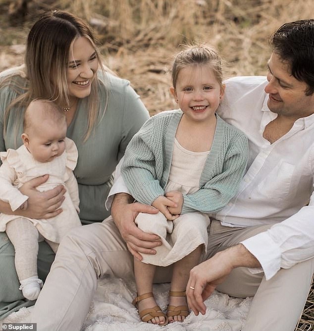 Adelaide dad Daniel Goodwin with his wife Danni and children Olivia, five, and Sophie, two