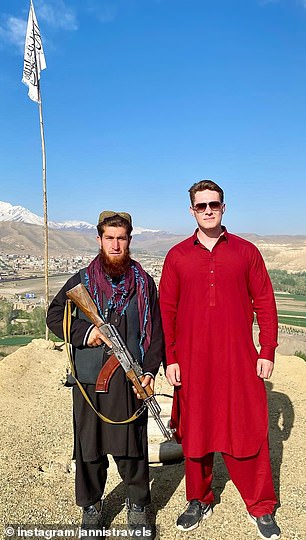 Jannis traveled to Afghanistan for a holiday. He tells MailOnline it was a 'great experience'. He is pictured here with a member of the Taliban