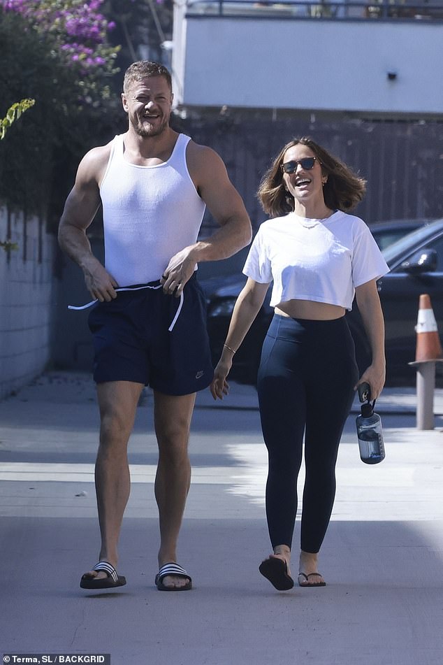 Imagine Dragons frontman Dan Reynolds and his actress girlfriend Minka Kelly exuded effortless charm during a casual day out in Los Angeles on Tuesday