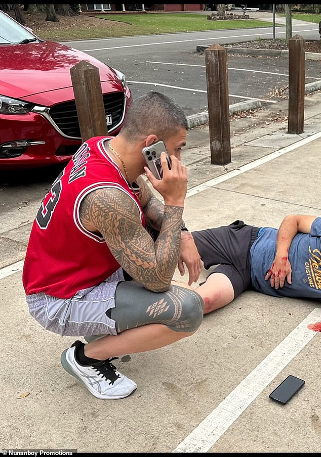 Pictured: The moment Tyson Pedro calls an ambulance after rushing to help a man who had a seizure and was convulsing on the sidewalk in front of him on Friday