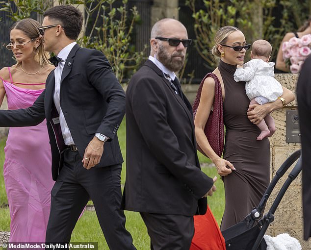 The Perth-based influencer, 30, was seen cradling her three-month-old daughter Isla as she celebrated Tammy marrying her Love Island Australia partner Matt Zukowski at Chateau Du Soleil