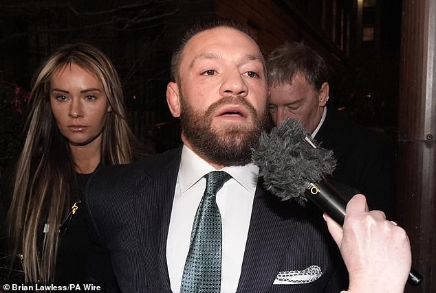 This photo of Conor McGregor's fiancée Dee Devlin leaving a courthouse has gone viral