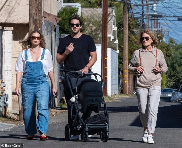 New parents Margot Robbie and Tom Ackerley on a coffee run with his mother in California