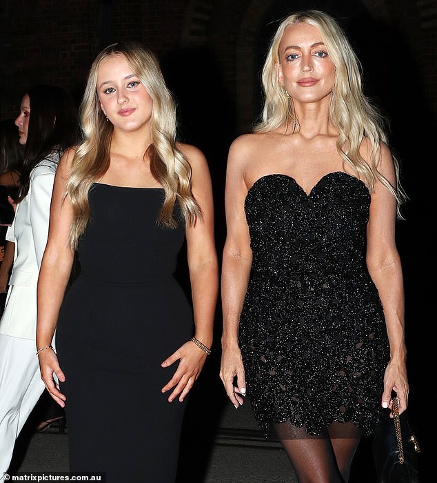 Jackie O and her daughter Kitty pictured during Australian Fashion Week in Sydney in May