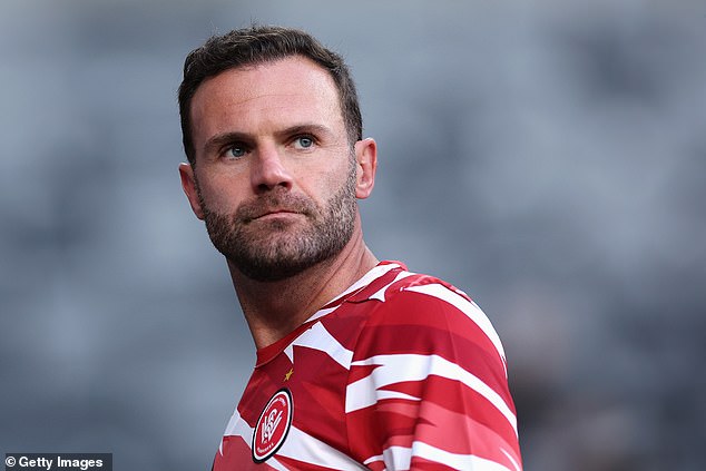 Juan Mata's agent has criticized an Australian football coach for his treatment of the ex-Man United star