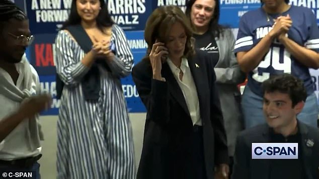 Kamala Harris has been caught in an embarrassing election day blunder after turning her cell phone towards the cameras while 