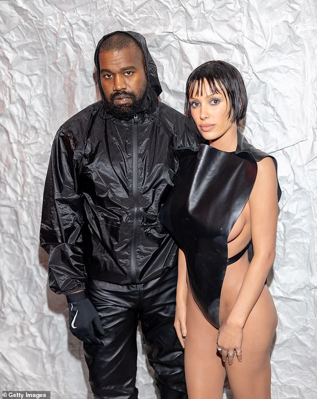 Kanye West faces a new lawsuit from an ex-employee accusing him of lewd conduct and anti-Semitism – pictured with wife Bianca Censori in February 2024