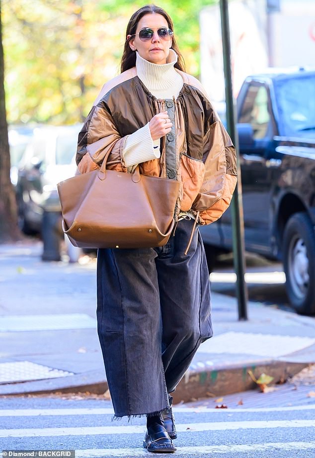 Katie Holmes went makeup-free as she was spotted walking around New York City this week during her run in a Broadway revival of Our Town