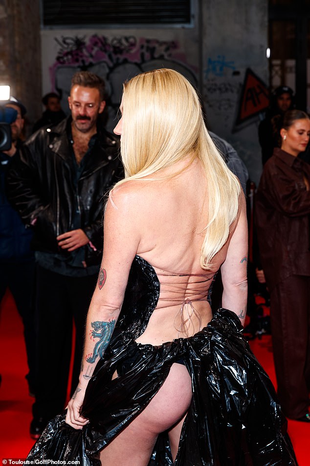 All eyes were on the 37-year-old singer during her animated red carpet appearance, which saw her almost completely naked in her racy 'garbage bag' outfit