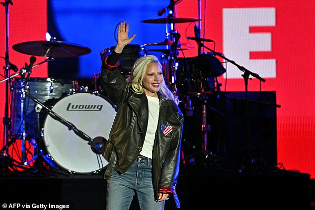 American singer Lady Gaga waves before performing at a campaign rally for US Vice President and Democratic presidential candidate Kamala Harris