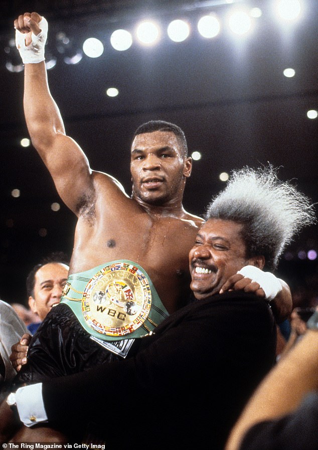 Don King (right) was Mike Tyson's promoter when he became the youngest ever heavyweight champion in 1986