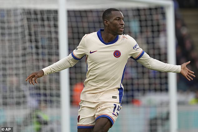 Nicolas Jackson celebrates after opening the scoring for Chelsea against Leicester