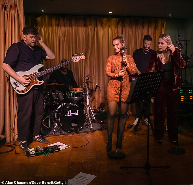 The former Eternal singer, 50, got into the party spirit in a red lace mini dress as she performed some of her songs