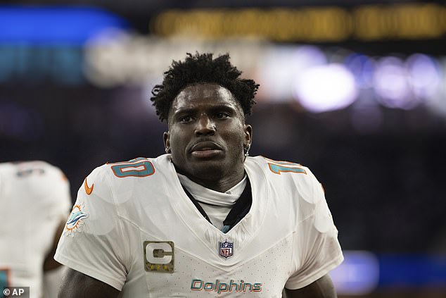 Miami Dolphins wide receiver Tyreek Hill (10) jogs back to the locker room on November 11