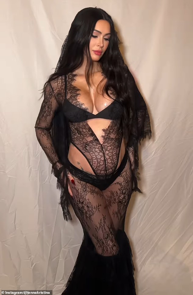 Megan Fox, 38, showed off her growing baby bump in a sheer black lace bodysuit with black panties and a bra. A lace veil was tied to her long, dark locks