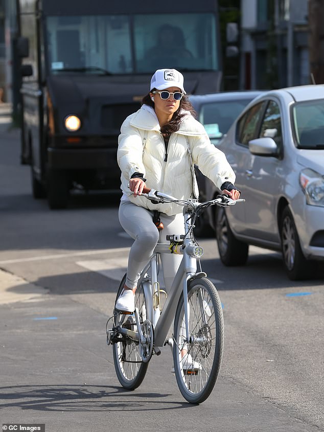 Michelle Rodriguez showed off her toned figure during a bike ride through Los Angeles on Wednesday