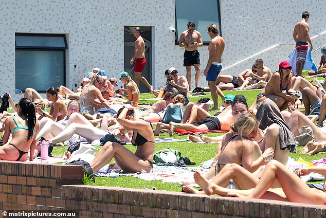 NSW's limited power supply combined with increased demand from air conditioners could lead to widespread power outages. The photo shows beachgoers at Bondi at the weekend