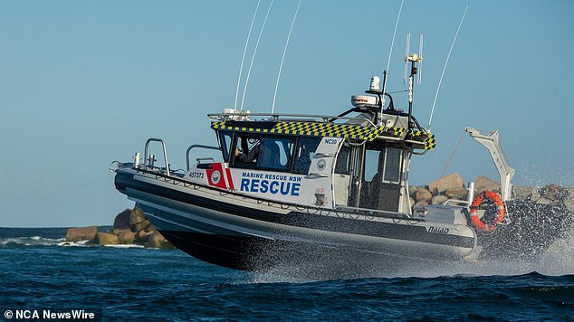 The crew member was on board the freighter Double Delight but had not been seen for almost 24 hours before he was found on the sands near Swansea.