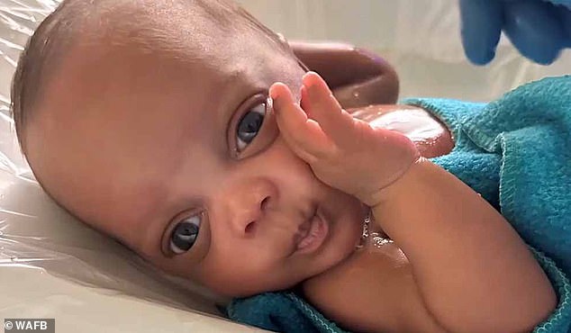 Baby Raylon, born weighing one pound, 10 ounces, defied all odds after his mother's body began to fail during pregnancy, leading to 107 days spent in the NICU